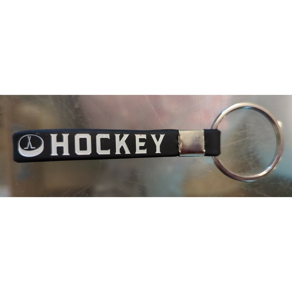 Brand New Inkstone Hockey Winners Never Quit Silicone Rubber Keychain Bracelet